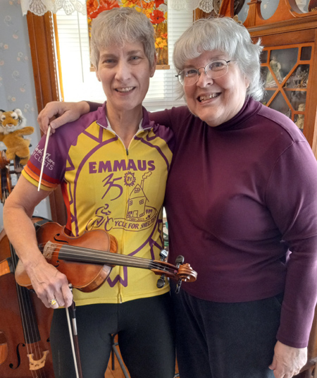 Carla Stein, violinist, and Joy Schuetze, conductor